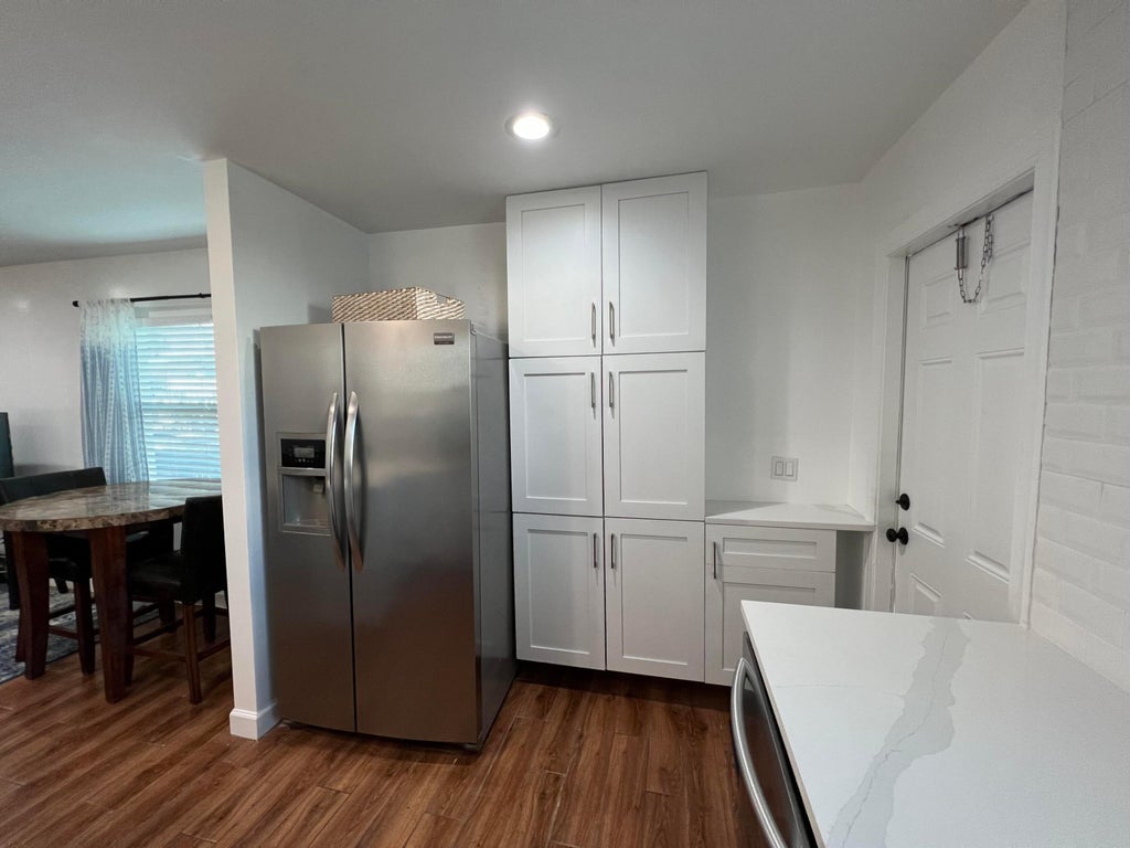 Photo of 4104 GARDEN Avenue, West Palm Beach, FL 33405 (MLS # B26078416)