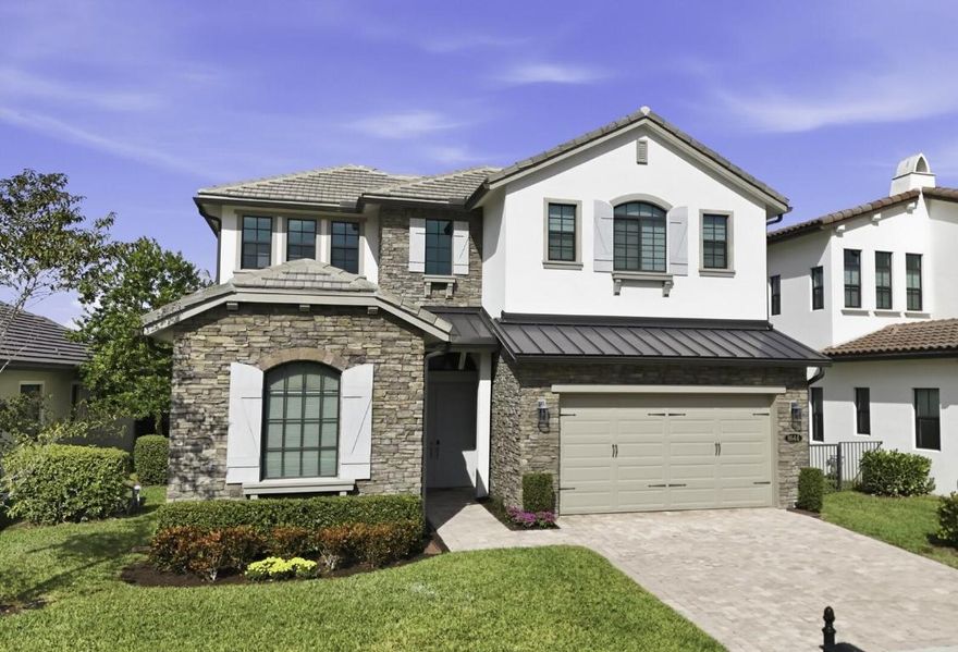 Unparalleled elegance with pool and panoramic lake views! This Provence model in Palm Meadows Estates is a stunning 4 bedroom plus den and loft, 4.5 bath home showcasing exceptional design and impressive upgrades throughout. A double-door entrance opens to an impressive two-story foyer, setting the tone for the elegant design throughout. The stunning chef's kitchen features quartz countertops, a gas stove with griddle, stainless steel farmhouse sink, stainless steel appliances, a large island with snack bar, pendant lighting, decorative tile backsplash, under-cabinet lighting, a butler's pantry area, and a walk-in pantry closet. The bright and spacious living room offers vaulted ceilings, abundant windows, and sliders to the patio. The dining area shines with a transom window, open-concept layout, and custom wall moldings, which continue throughout the home for a refined touch.

The first-floor primary suite is a luxurious retreat with a double tray ceiling, high ceilings, dual closets with custom organizers, and tranquil views of the pool and lake. The spa-like primary bath includes a soaking tub, step-in shower with bench seat, large subway tile, dual quartz-topped counters, and framed mirrors.

Additional features include smooth walls, impact windows, cellular shades throughout, curved arches, and a whole-house generator for peace of mind.

Step outside to the covered patio overlooking a custom pool with sun shelf, water feature, fenced yard, and serene lake view perfect for relaxation or entertaining.

This exceptional home combines style, comfort, and function in one breathtaking package.

The resort-style Palm Meadows clubhouse is designed with every detail in mind, featuring a sparkling, oasis-inspired pool, a state-of-the-art fitness center, an indoor sports court, pickleball, and tennis. Families will love the additional amenities, including a kid's splash zone, tot lot, and more. Scroll down to view the full list of community features!