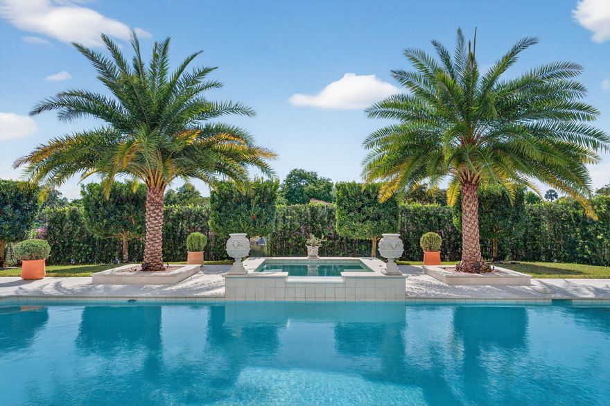 Beautifully enhanced 5 Bed+Den, 3.5 bath home in Parkland featuring over 3,400 sq ft of living space and a fully renovated resort-style backyard. New tile ROOF Oct 2025 with an 8-year transferable warranty. Polished travertine flooring. Interior upgrades include new wood floors upstairs, solid wood doors with Baldwin gold hardware, custom closets, and a Murano chandelier. Freshly painted interiors and exterior; the kitchen & laundry areas have been refreshed with upgraded appliances and finishes. A large playroom/TV room, one spacious bedroom, one full bathroom, and a half bathroom on the first story. Upstairs, the primary suite offers a spa-like bathroom with a steam shower and dual vanities, three bedrooms, and a full bathroom. Impact windows and doors, AC systems 2023 & 2021 with  antimicrobial duct coating treatment and UV Light, water purification system. The backyard has been transformed into a private, resort-style OASIS. The outdoor space features marble tiles, a large pool and spa, an outdoor kitchen, and professionally designed landscaping with exclusive, unique trees and plants, and architectural landscape lighting, creating a private garden sanctuary that provides a tranquil environment ideal for relaxing or entertaining. Whether hosting friends or enjoying a quiet evening, this outdoor setting feels both intimate and exceptional. Located within the highly desirable Parkland community of Whittier Oaks, this residence is situated in the coveted Estates section, known for its more spacious homes, private settings, and select lot positions with HOA-maintained landscaping for easy living. Ideally located just steps away from the beautiful Terramar Park. List of detailed Features and Upgrades upon request. Schedule your private showing today!