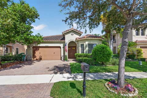 Photo of 7443 NW 113TH Avenue, Parkland, FL 33076 (MLS # B26063531)