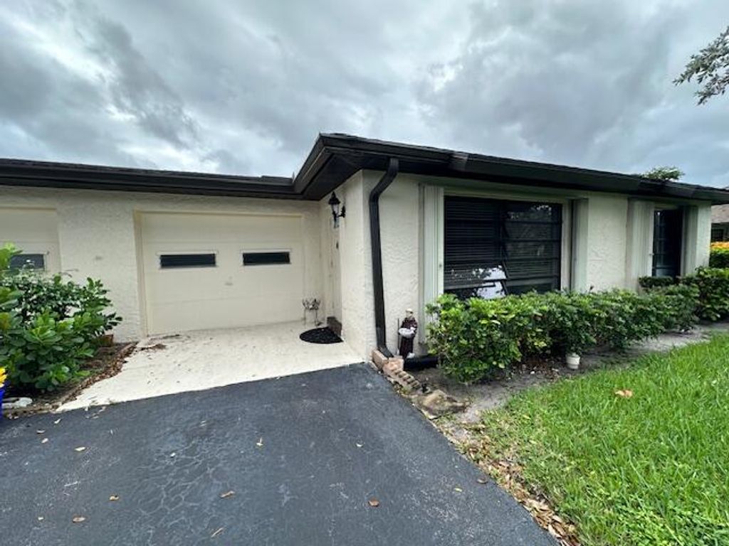 Photo of 10429 Quailwood Lane #B, Boynton Beach, FL 33436 (MLS # R11028453)