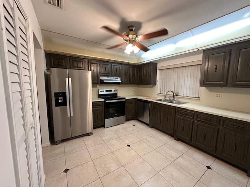 Photo of 10429 Quailwood Lane #B, Boynton Beach, FL 33436 (MLS # R11028453)