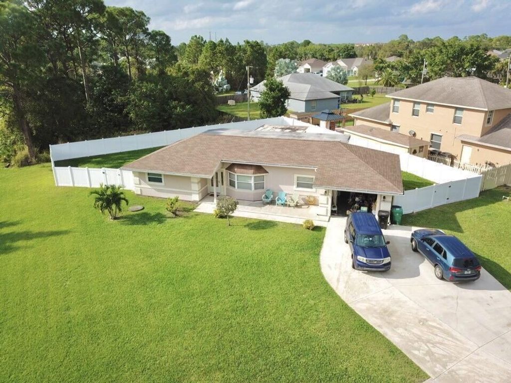 Photo of 2990 SW Collings Drive, Port St Lucie, FL 34953 (MLS # R10852243)