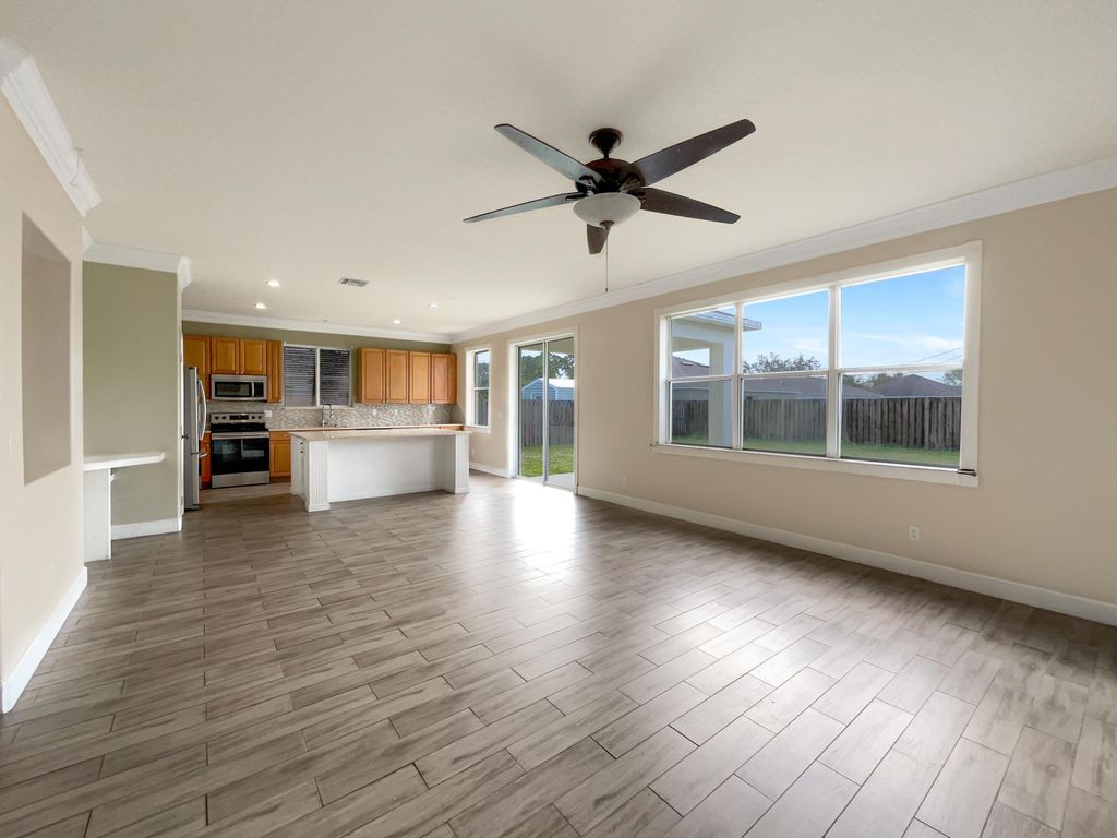 Photo of 320 SW Kane Street, Port Saint Lucie, FL 34953 (MLS # R10958227)