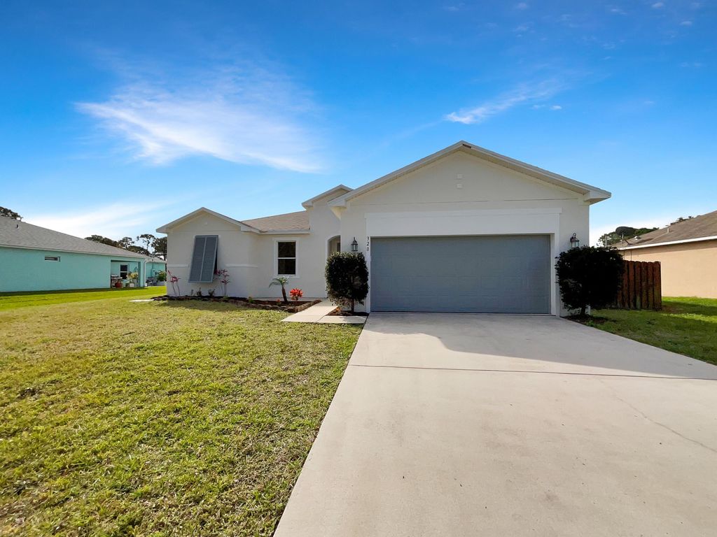 Photo of 320 SW Kane Street, Port Saint Lucie, FL 34953 (MLS # R10958227)