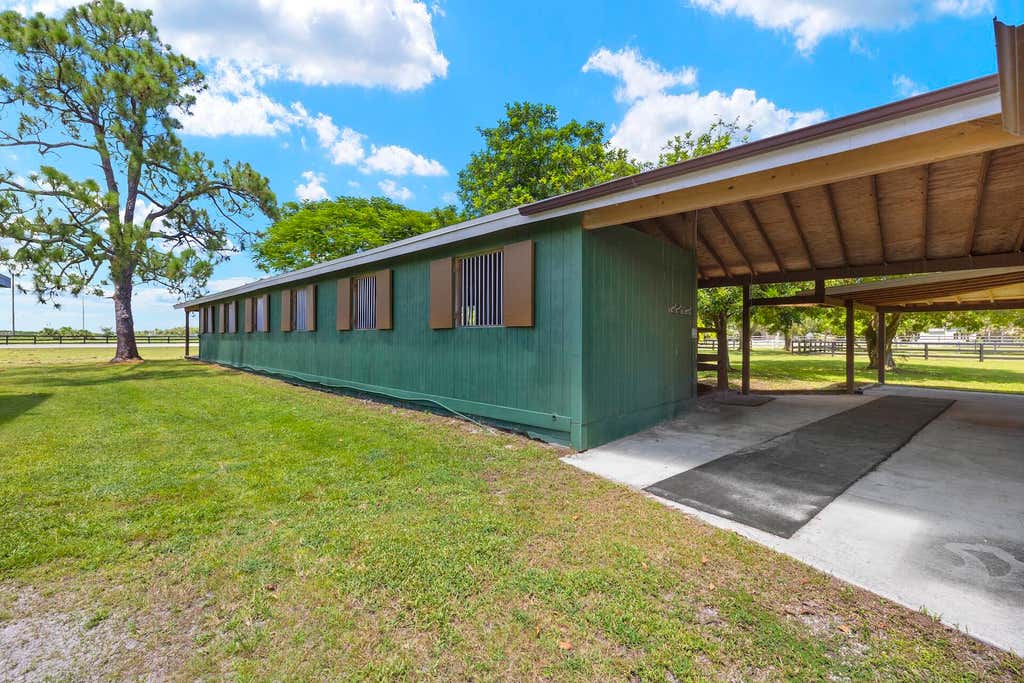 Photo of 16031 Rustic Road, Wellington, FL 33470 (MLS # B26023195)
