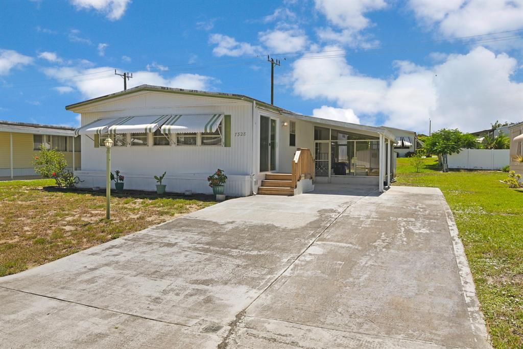 Photo of 7328 SE Swan Avenue Ave, Hobe Sound, FL 33455 (MLS # R10818505)