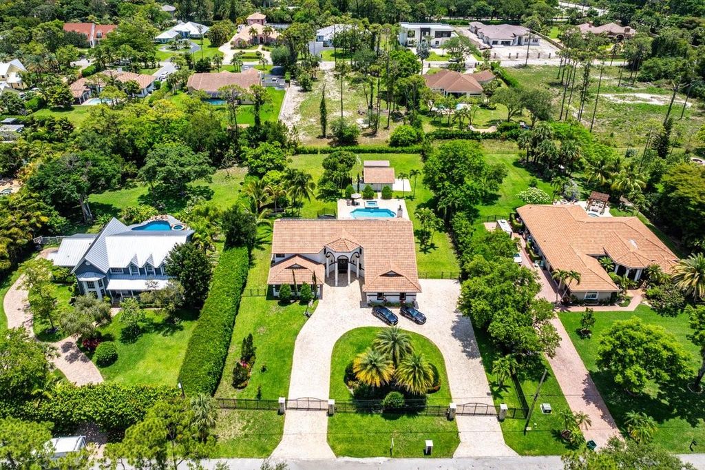 Photo of 6672 NW 63rd Way, Parkland, FL 33067 (MLS # F10505006)