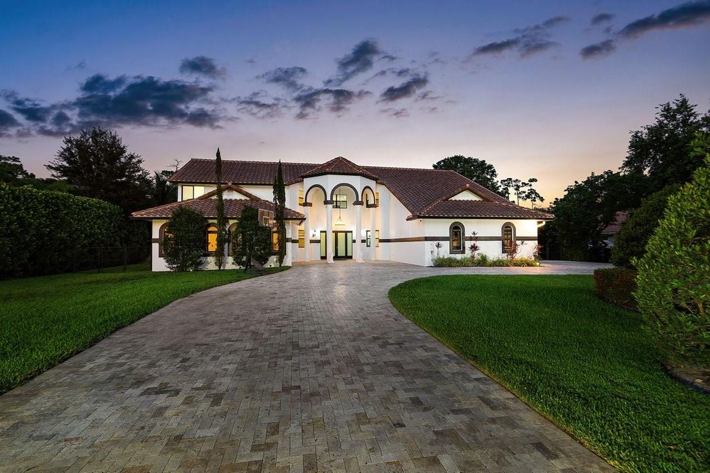 Photo of 6672 NW 63rd Way, Parkland, FL 33067 (MLS # F10505006)