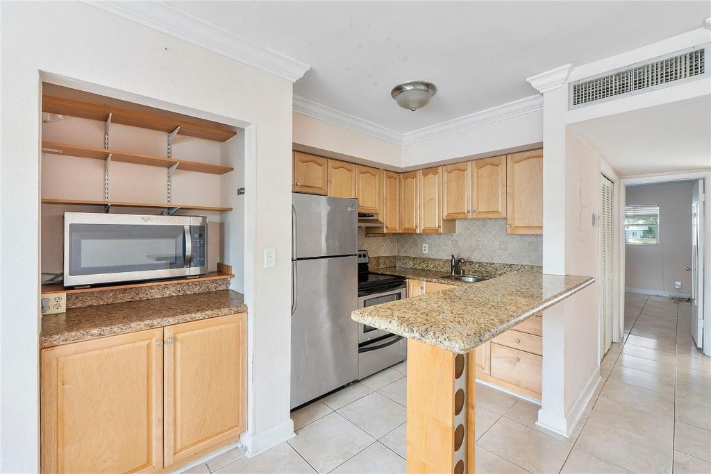 Photo of 4050 NE 12th Terrace #39-2, Oakland Park, FL 33334 (MLS # F10535523)