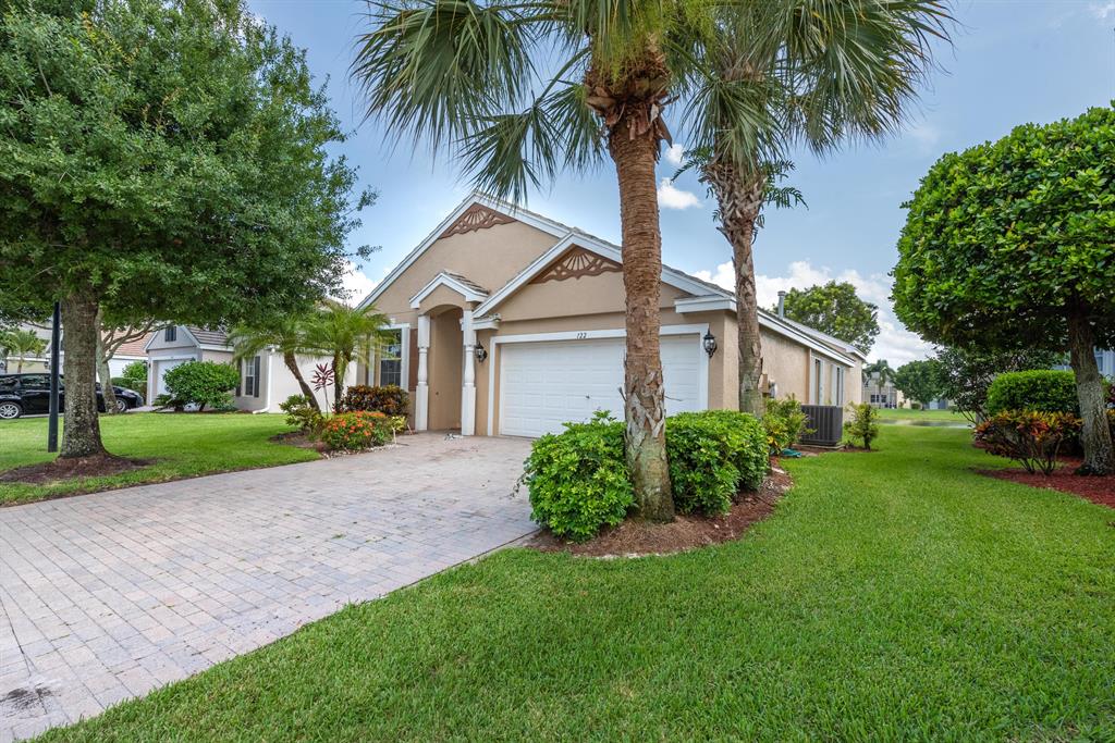 Photo of 122 Newberry Lane, Royal Palm Beach, FL 33414 (MLS # R10735408)