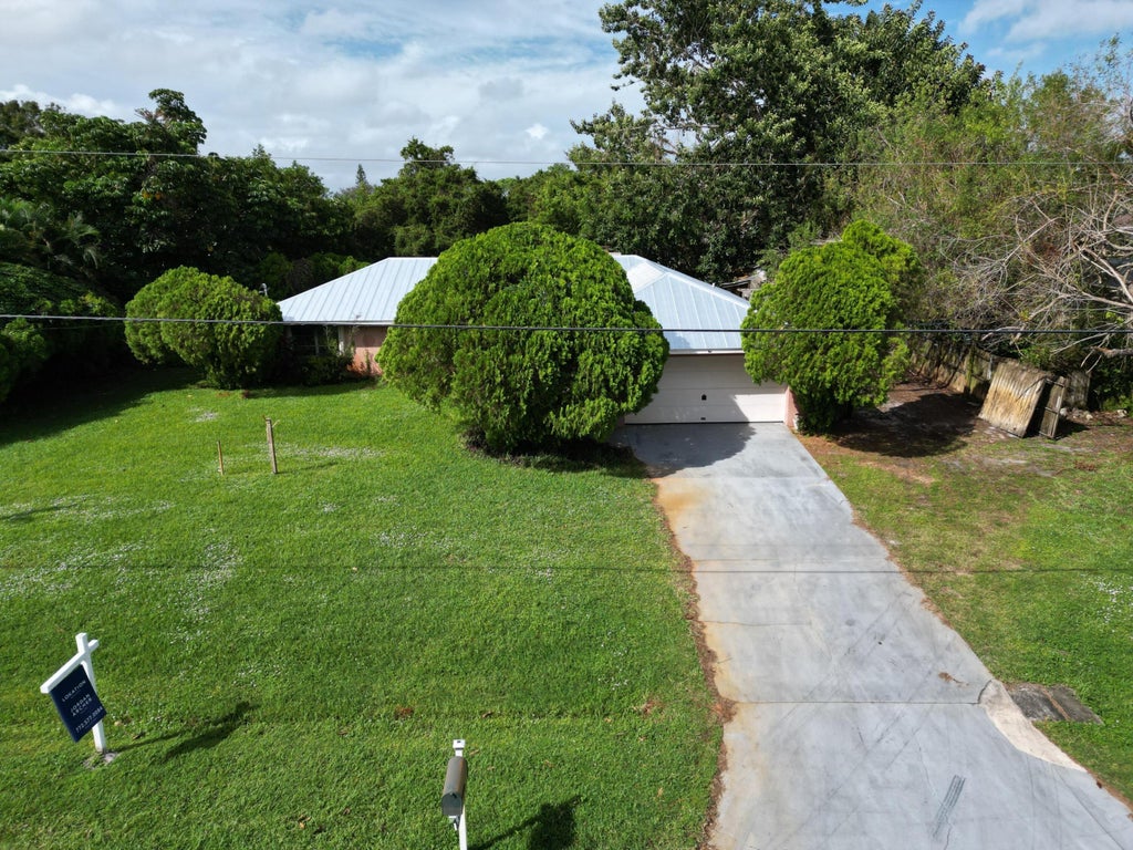 Photo of 2151 SE Abcor Road, Port Saint Lucie, FL 34952 (MLS # R11037583)