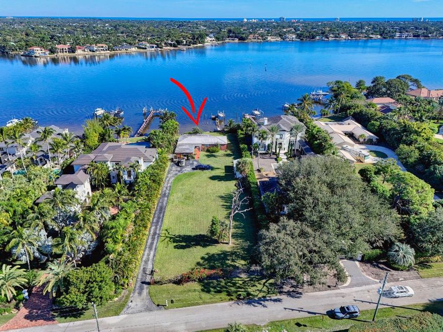 Rarely available opportunity to build on a spectacular estate sized lot in Pennock Point.  Breathtaking wide Loxahatchee River views add to this exciting offering. Pennock Point is a unique area that feels as if it's a million miles away, but is centrally located in close proximity to restaurants, shopping, the airport, and all that Jupiter and Northern Palm Beach County has to offer. Old house on the property has no value.