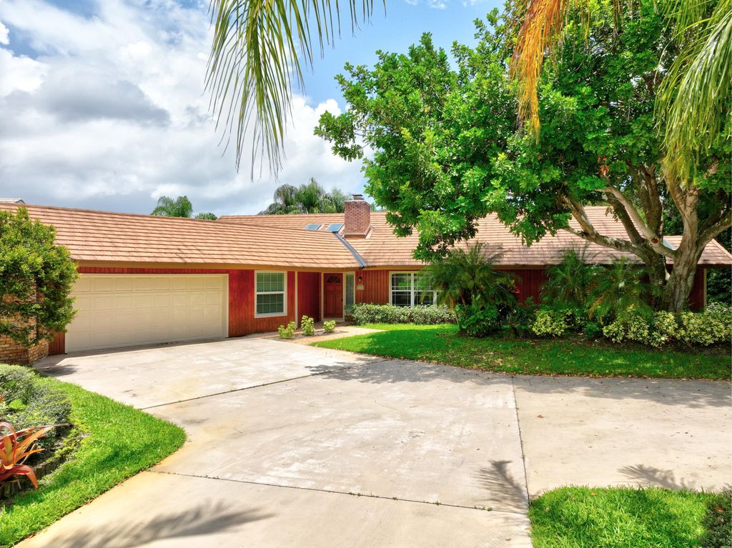 Photo of 5741 SE Winged Foot Drive, Stuart, FL 34997 (MLS # R10819210)