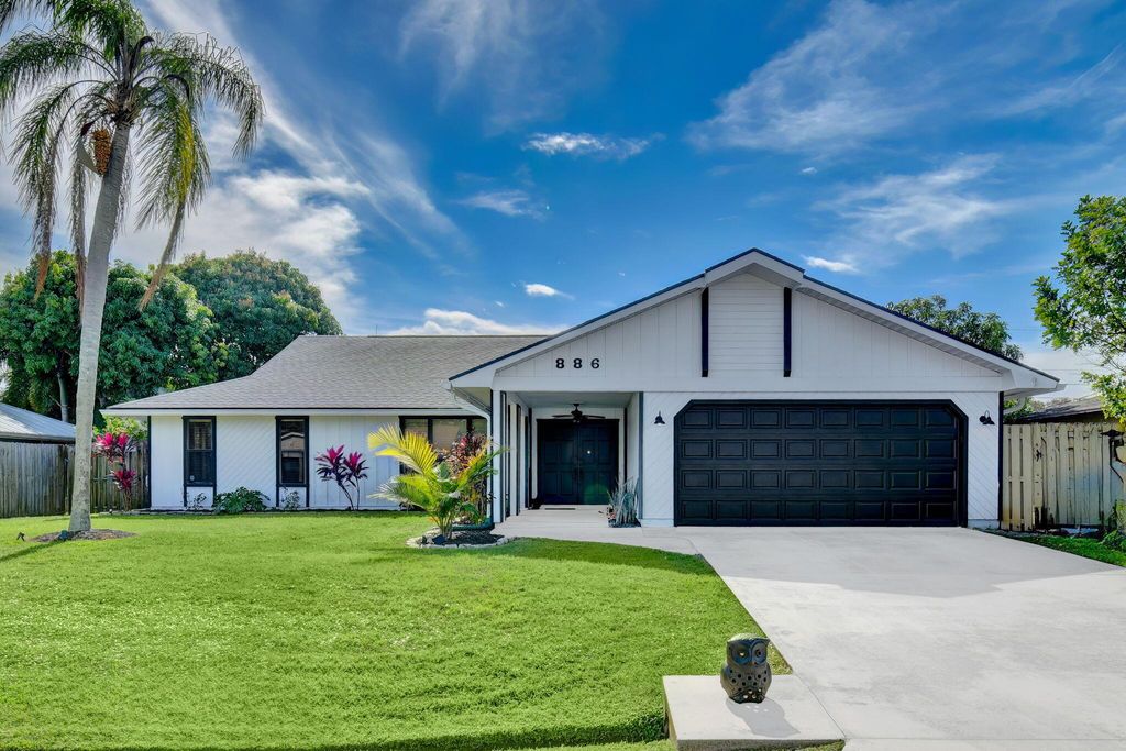 Photo of 886 SE Starflower Avenue, Port Saint Lucie, FL 34983 (MLS # R10946286)