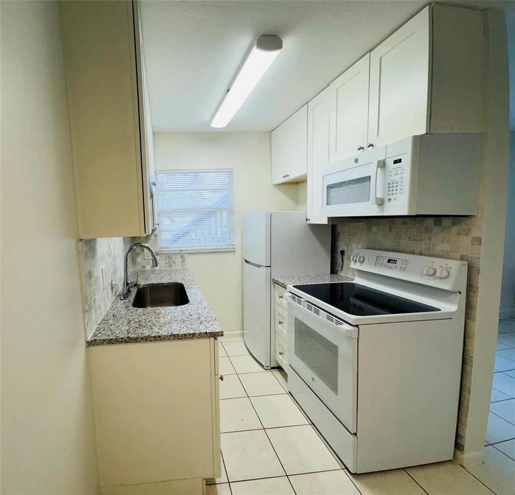 Photo of 801 S Federal Highway #101, Lake Worth Beach, FL 33460 (MLS # F10508166)