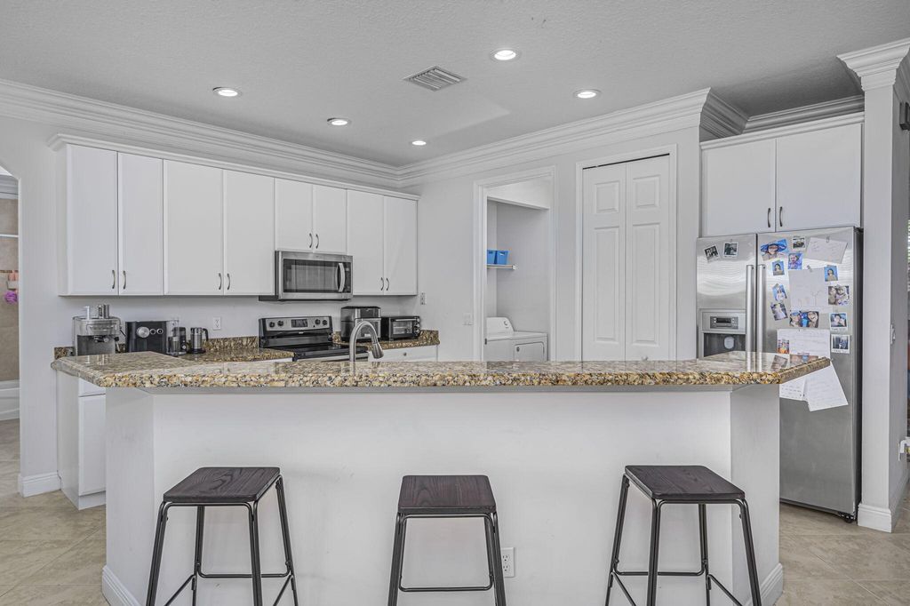 Photo of 2311 SW Halissee Street, Port Saint Lucie, FL 34953 (MLS # R11020325)