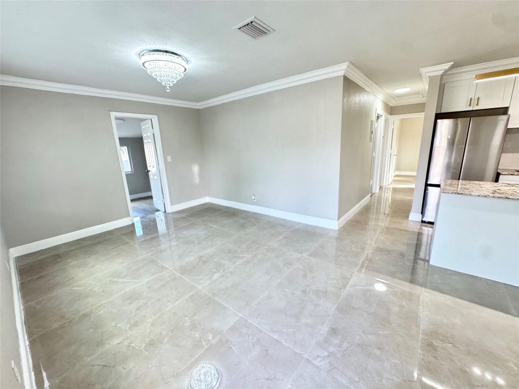 Photo of 1020 NW 26th Avenue, Fort Lauderdale, FL 33311 (MLS # B26022463)