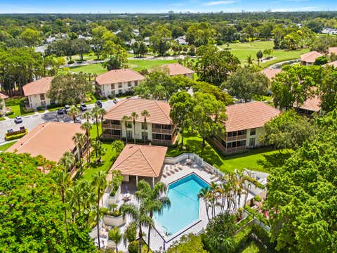 Photo of 218 Brackenwood Terrace, Palm Beach Gardens, FL 33418 (MLS # B26050661)