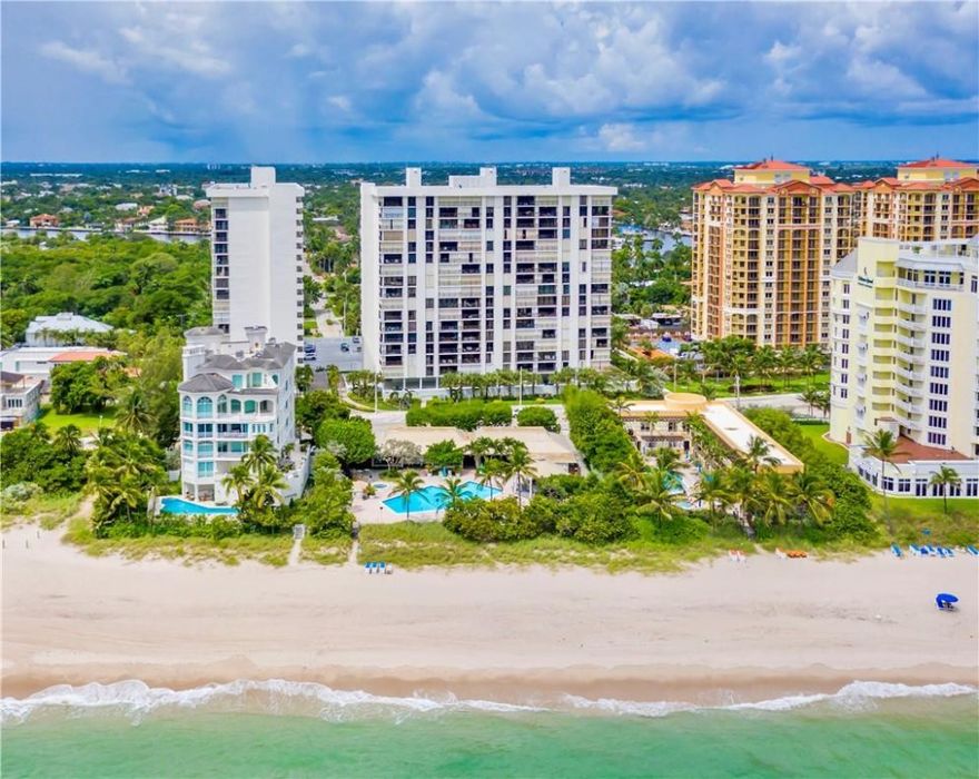 Newly Remodeled in Modern Fashion Beach Front Condo . This Bright and Spacious 2nd Floor Unit  is Fully Wired as a Smart Home. Features Include  New Impact Windows throughout, Large White Ceramic Tile Throughout, New open Kitchen with Quartz Counters SS Appliances, Brand New Appliances, Recess Lighting, Under Cabinets Lights, Washer and Dryer, 65'' TV with Intergraded  Entertainment System & Full Surround Sound all Remote Controlled, New Modern Bathrooms with Custom Fixtures & Frameless Shower Doors, Large Balcony with Partial Ocean ViewNew A/C, New Electrical Panel, New Baseboards, and Fresh Paint. Elevator takes you right to the Front Door. Building is Gated with Doorman 24/7. Unit includes 1 Underground parking and Storage plus Guest. Beach Pavilion Offers Pool, Gym,Billiard Table &BBQ.