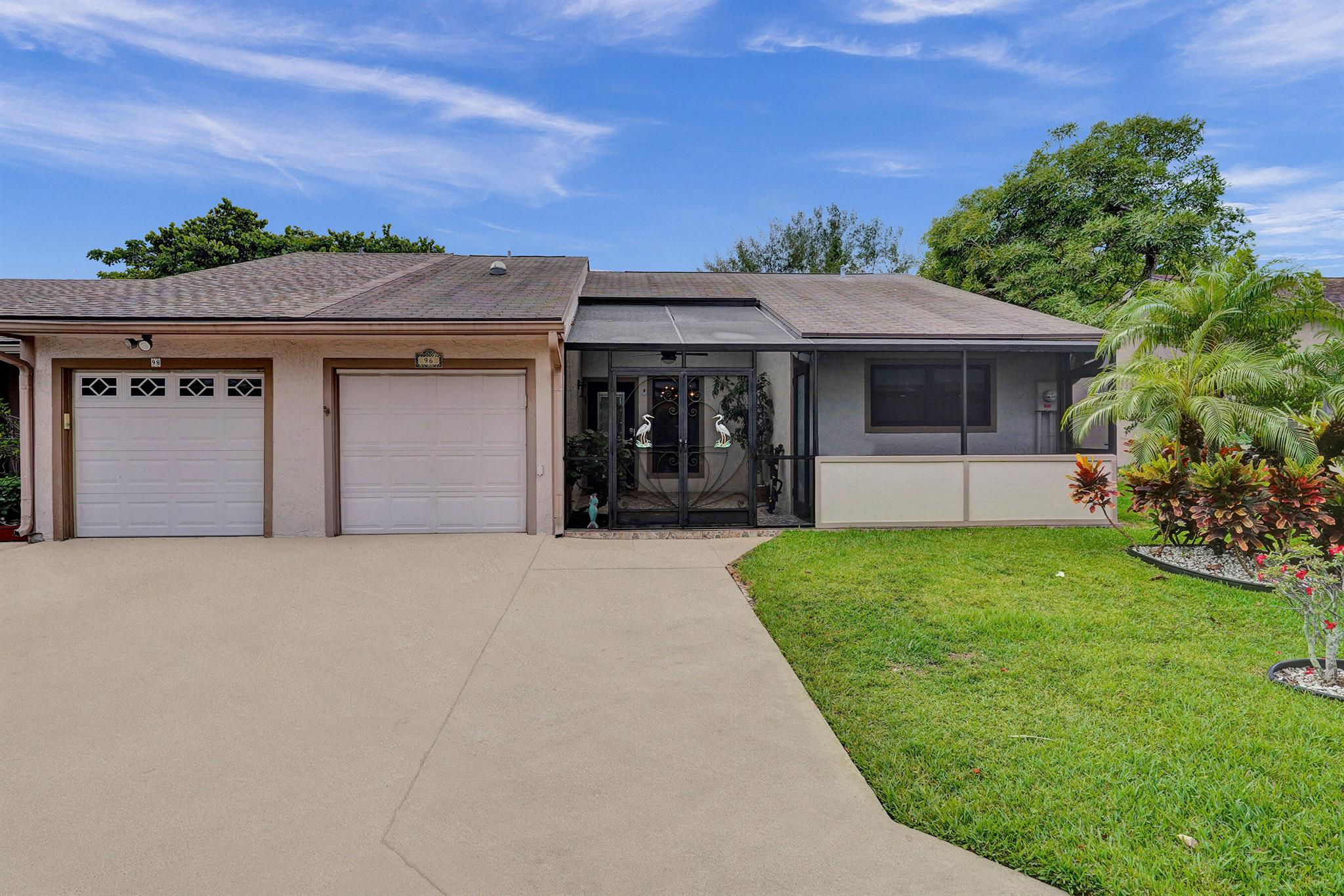 This rare 3-bedroom waterfront villa in the heart of Boynton Beach is a truly unique find. Fully remodeled w/ no expense spared, this home features a brand new roof, designer finishes, & an open-concept layout that blends style & functionality. The exterior is just as impressive, showcasing French pattern travertine, lush green space, and a brand new double dock, ideal for boating, entertaining, fishing, kayaking, or paddle boarding. The backyard offers total privacy with no neighbors behind, creating a serene outdoor retreat. Additional highlights include a 1-car garage, low HOA fees, & a location that's second to none - just minutes from top-rated restaurants, shops, beaches, and major highways. Whether you're looking for a full-time residence or a luxury getaway, this home is it!
