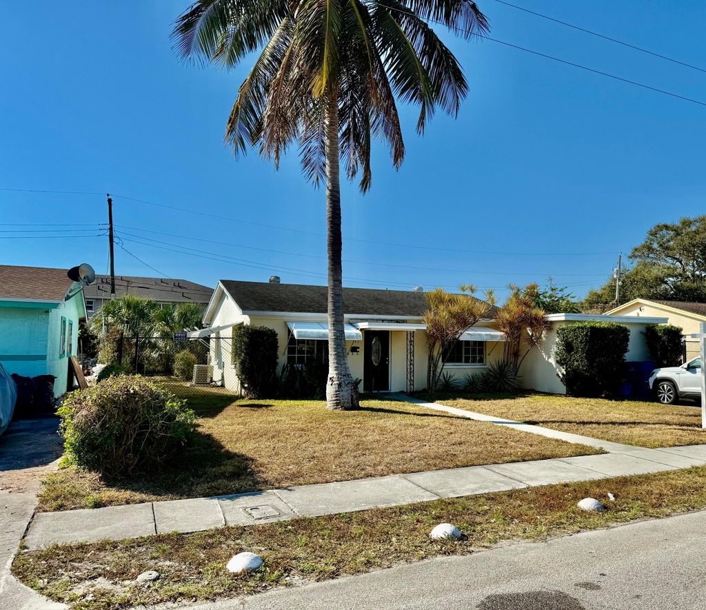 Photo of 137 W 34th Street, Riviera Beach, FL 33404 (MLS # R11163546)