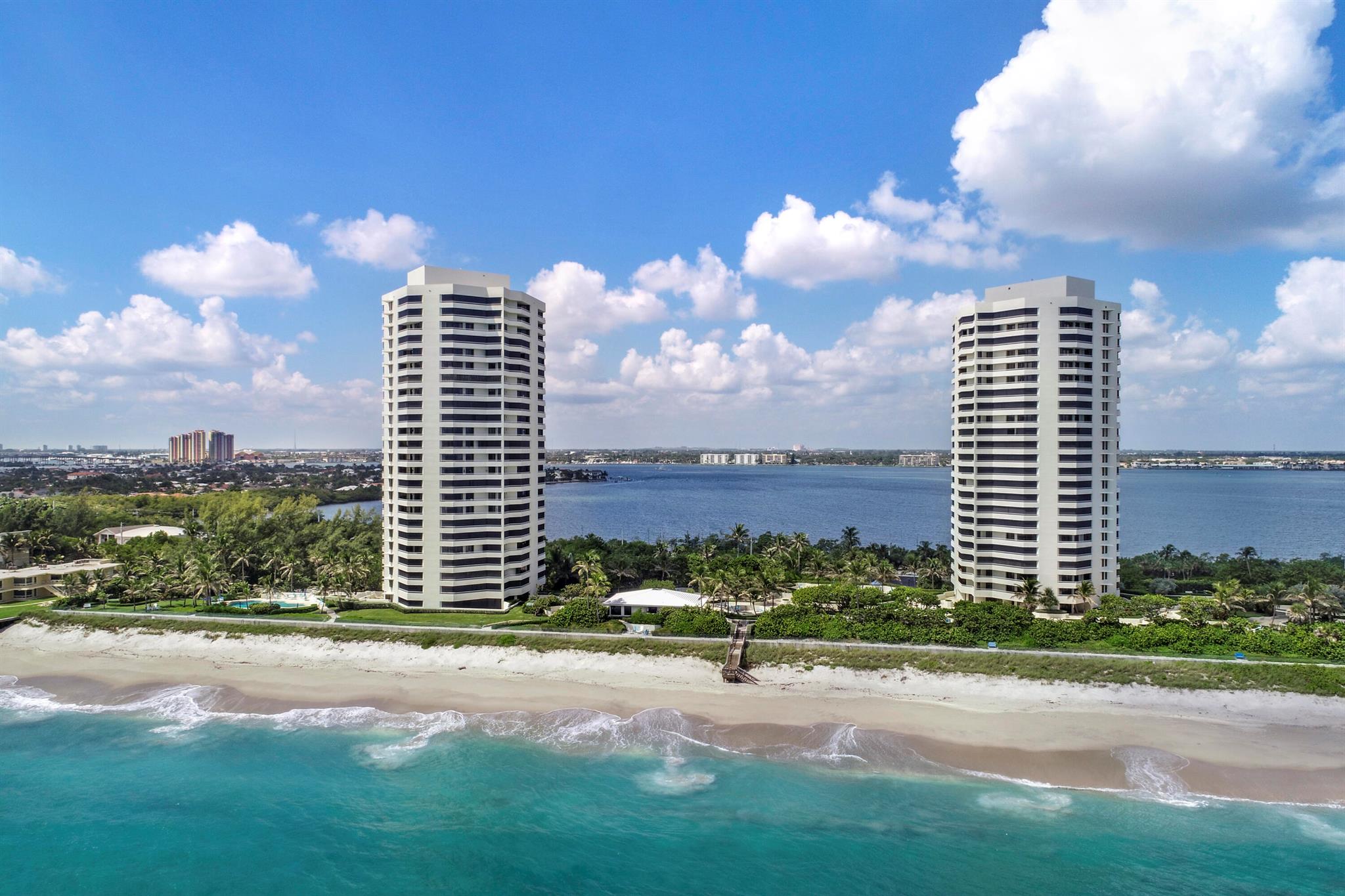Enjoy a beach styled residence with wrap around views of sparkling water from every room. Two roomy bedrooms with walk in closets. There are two full beds in the guest room. Parking is in a garage, and washers and dryers provide convenience in your condo. You'll have the amenities of a luxury resort with tennis, pickleball,2 pools, Jacuzzis, and 990 feet of beachfront with clear white sand. Owners enjoy surfing, paddleboarding, swimming and sunning on the large stretch of oceanfront. State of the art fitness center with new equipment is available with ocean views.
