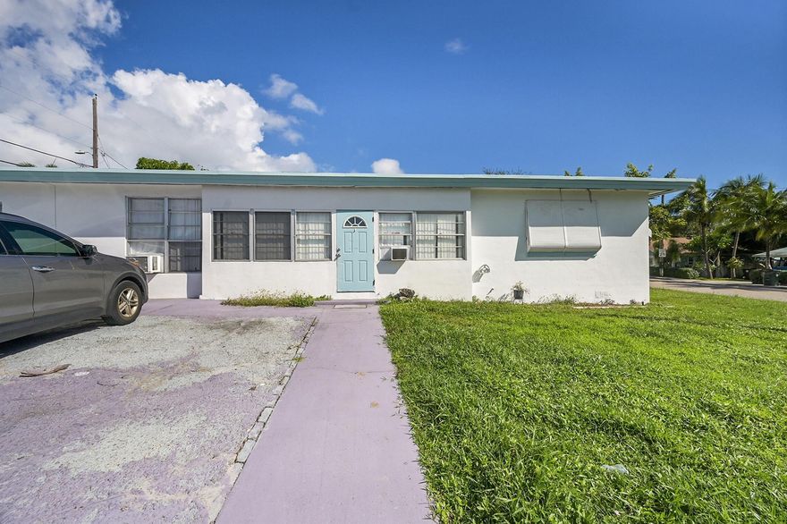 Well-maintained 3-bedroom, 2-bath home featuring two master bedrooms and a flexible layout with great investment potential! Currently fully leased used as a 2/1 + 1/1 duplex, the property can also function as a single-family 3/2 residence. It's an excellent income-producing opportunity with strong rental potential. Recent improvements include a roof meeting current wind and storm insurance codes, updated kitchens, bathrooms, flooring, paint, and appliances. Fully fenced with off-street parking for up to four vehicles. The converted master suite with a private exterior entrance is ideal for an in-law suite, studio, or additional rental unit. Conveniently located near downtown West Palm Beach, downtown Lake Worth, I-95, and the beach--ready for immediate occupancy or continued rental income
