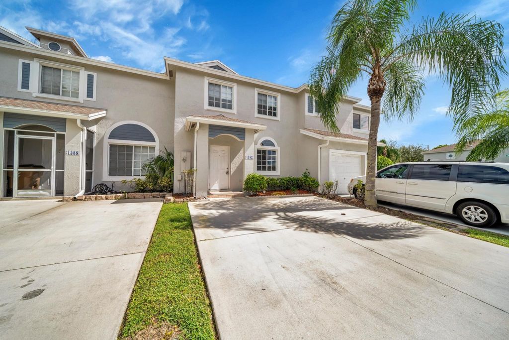 Photo of 1392 SW 47th Avenue, Deerfield Beach, FL 33442 (MLS # F10461279)