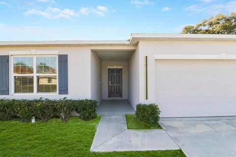 Photo of 2120 SW Trenton Ln, Port Saint Lucie, FL 34984 (MLS # R11166775)