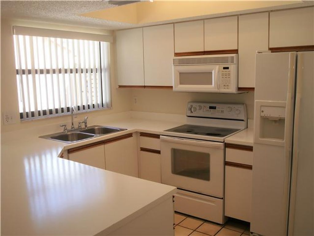 Photo of 13717 Yarmouth Drive #B, Wellington, FL 33414 (MLS # R11168629)