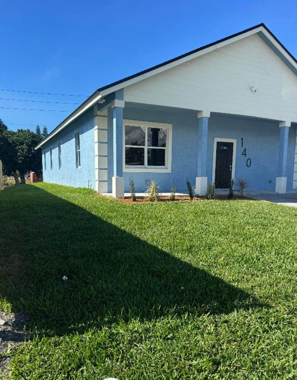 Photo of 140 SW 6th Avenue, South Bay, FL 33493 (MLS # R11151954)