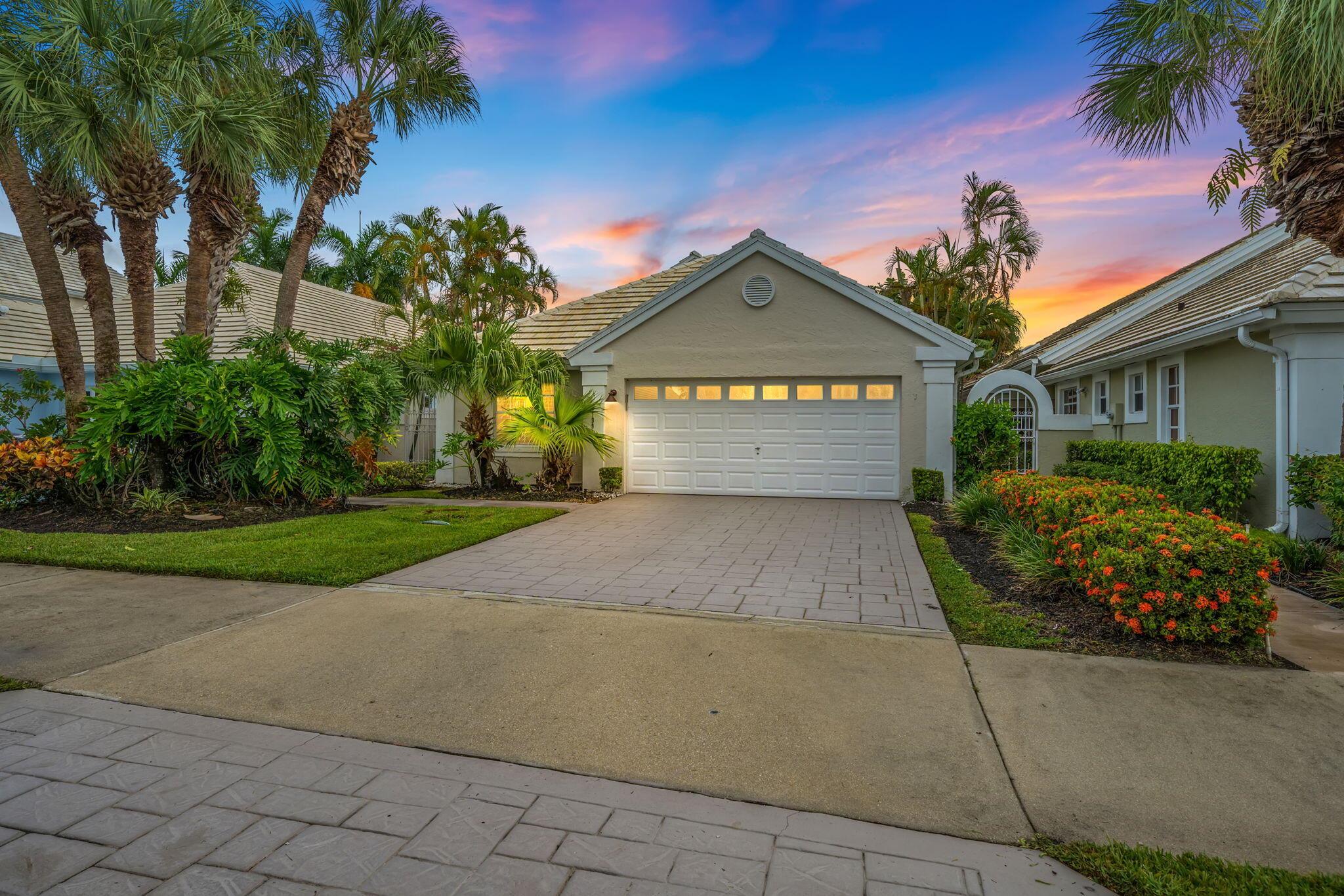 Welcome home to this 3 bedroom, 2 bathroom waterfront home in The Colony at Breakers West, where comfort, style, and a resort-inspired lifestyle come together. You'll love the open-concept layout, soaring volume ceilings, and coastal-inspired colors that create a bright, inviting atmosphere from the moment you walk in. The split floor plan provides privacy, while the main living area and primary suite showcase serene lake views and direct access to your private screened-in pool and spa. Picture mornings spent sipping coffee by the water, afternoons hosting cookouts at the built-in outdoor kitchen, and evenings unwinding in the spa. Breakers West is unique because club memberships are optional, giving you the freedom to enjoy the community without added commitments.