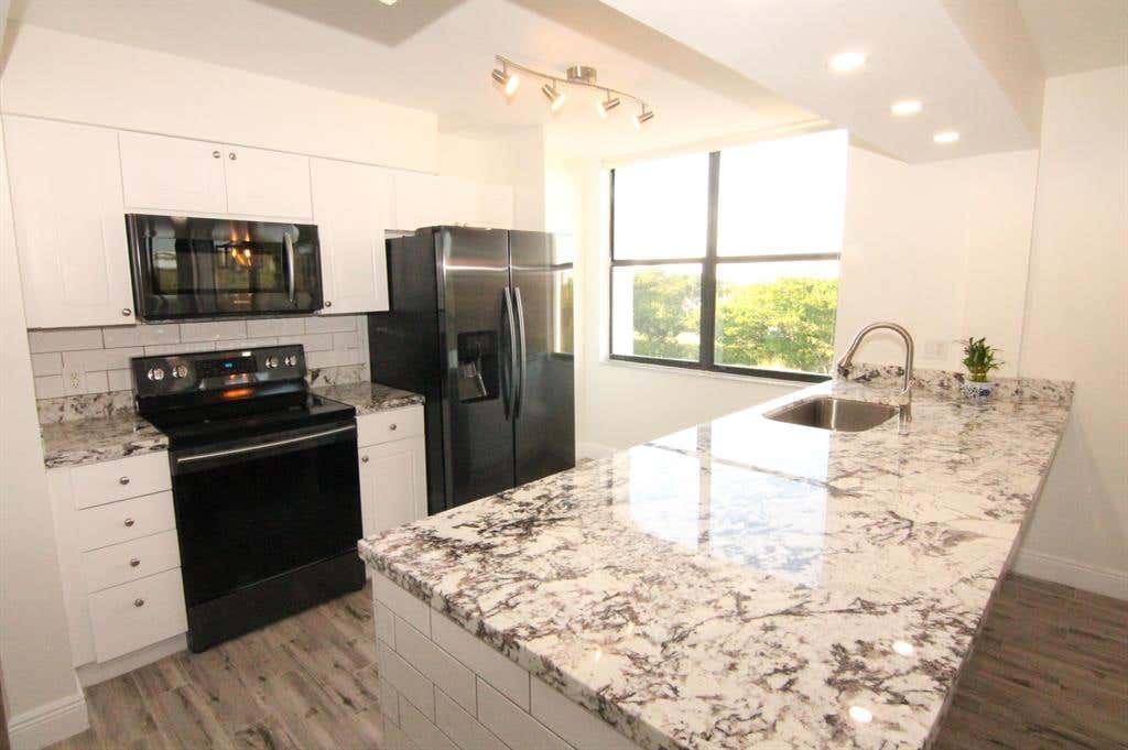 Photo of 950 Lavers Circle #F501, Delray Beach, FL 33444 (MLS # R10721272)