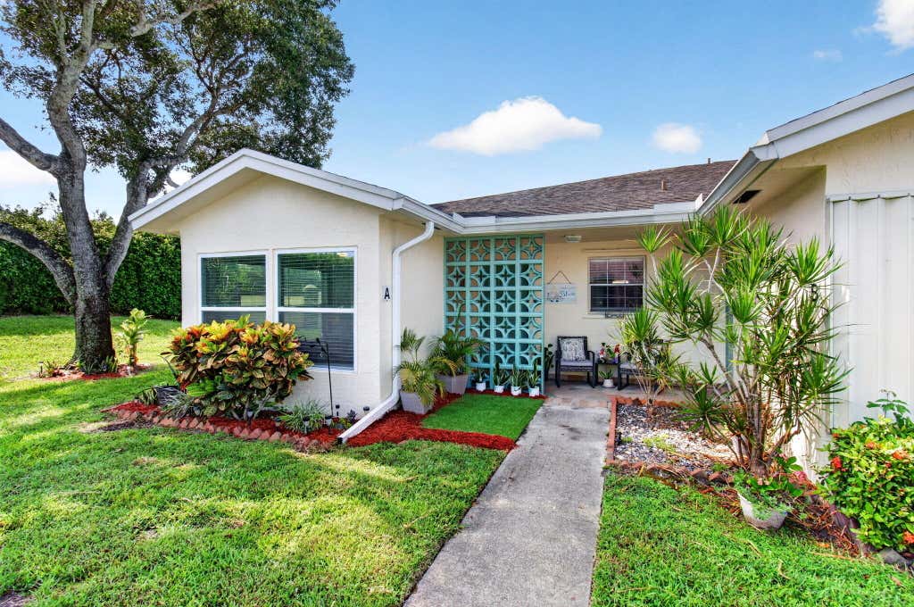 Photo of 5025 Lakefront Boulevard #A, Delray Beach, FL 33484 (MLS # B26066816)