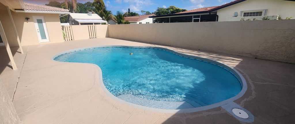 Photo of 8478 NW 14th Court, Coral Springs, FL 33071 (MLS # B26012246)