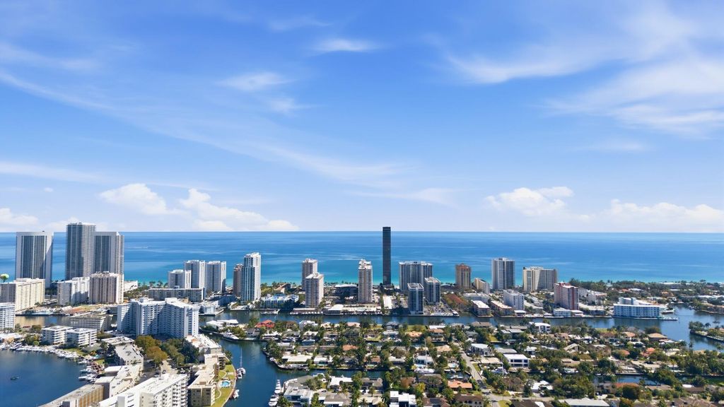 Photo of 401 Golden Isles Drive #1009, Hallandale Beach, FL 33009 (MLS # R11164322)