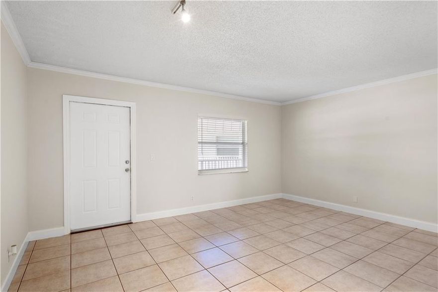 THIS IS A GREAT BUY.  Wonderful second floor walk up unit in gated community.  This is a 1/1 all tiled throughout condo with great view of community pool.  IMPACT WINDOWS THROUGHOUT.  Central a/c Unit has a brand new electrical panel, new hot water tank.   Freshly painted unit.   Kitchen has stove-refrigerator, dishwasher.  Complex has a new roof (2020), and reserves in place for painting and landscaping. 40 year inspection was done.  Beautiful large courtyard pool.   Community laundry same floor.  Community collects reserves in maintenance.  RENTING ALLOWED IMMEDIATELY  MINIMUM 1 YEAR RENTALS.PETS PERMITTED.   GREAT FOR INVESTMENT OR AS YOUR NEW CONDO HOME.   SELLER OFFERING A CREDIT AT CLOSING FOR ASSESSMENT.