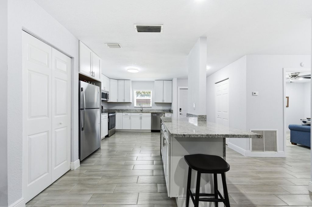 Photo of 586 Laconia Circle, Lake Worth, FL 33467 (MLS # B26016109)