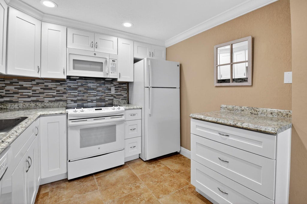 Photo of 122 Burgundy C, Delray Beach, FL 33484 (MLS # R11046100)