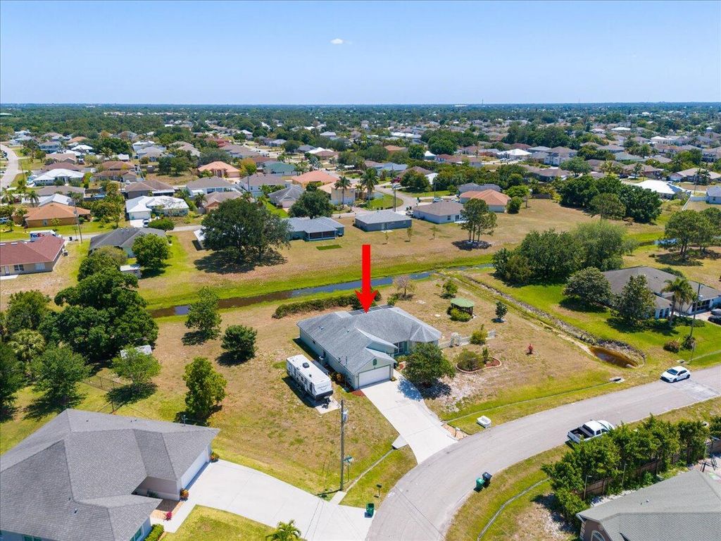 Photo of 3801 SW Mccrory Street, Port Saint Lucie, FL 34953 (MLS # R11082871)