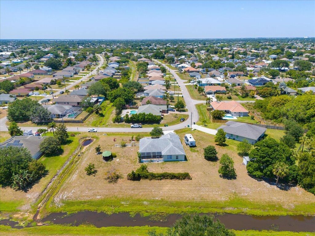 Photo of 3801 SW Mccrory Street, Port Saint Lucie, FL 34953 (MLS # R11082871)