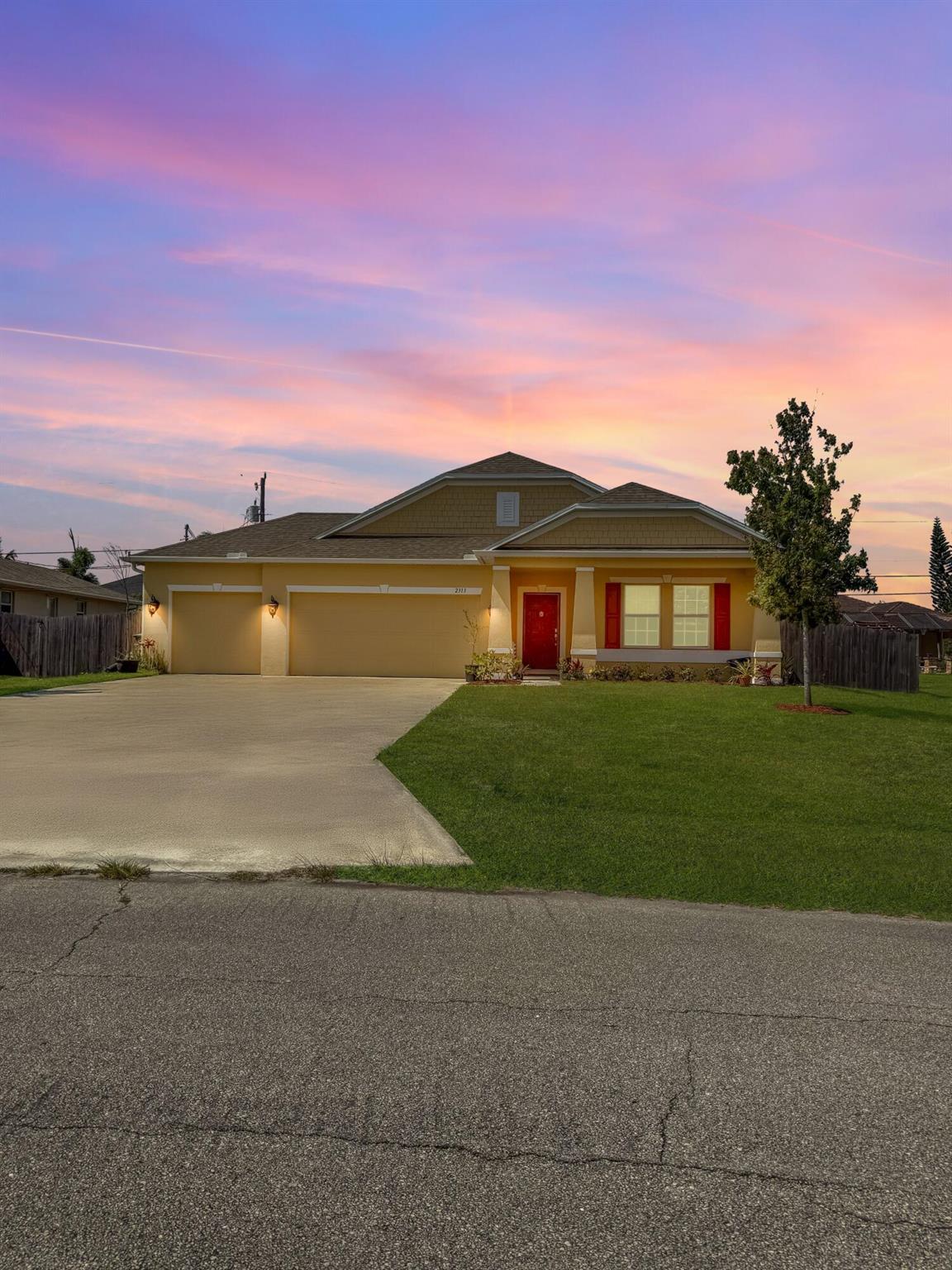 ***MAJOR PRICE ADJUSTMENT*** FANTASTIC OPPORTUNITY and... You will feel right at home when you enter this 4/2 with great room, ofc/den and 3-car garage. Beautifully tiled floors throughout main areas. Carpet in bedrooms. Kitchen has pantry, 42'' cabinets and granite countertops. Plenty of cabinet space and island w/built-in storage. Appls stay. Master bedroom has walk-in closet & tray ceiling. Storage/linen closet just outside bedroom. Bath has tiled shower and separate soaking tub. Another linen closet in hallway by 3 bedrooms. Laundry room near bedrooms. Guest bath has double sinks. Covered patio in back w/extended concrete slab - great for bbq's. House built in 2017. Large back & side yards fenced. **Just minutes away from Tradition, shops, restaurants, hospital and I-95