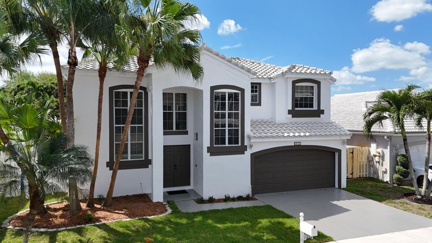 Discover refined modern living in the sought-after community of The Landings! This stunning home has undergone a complete, top-to-bottom renovation, leaving no detail overlooked and delivering true move-in-ready perfection. Step inside to find brand-new flooring throughout the main level, pristine upstairs carpeting that has never been walked on, a fully updated kitchen featuring sleek granite countertops and new appliances, beautifully renovated bathrooms, and fresh interior and exterior paint for a crisp, contemporary feel. Outside, the sparkling pool serves as the centerpiece of an expansive, entertainer-ready backyard—ideal for family gatherings, weekend barbecues, or relaxing Florida evenings with friends. Nestled in a vibrant, convenient neighborhood, this home offers easy access to  nearby supermarkets, fitness centers, major interstates, and all the best that Florida living has to offer. Meticulously maintained and thoughtfully upgraded, this residence is truly turn-key and ready for its next owner to move in and start making memories. Don't miss this exceptional opportunity—schedule your private showing today and experience the difference for yourself!