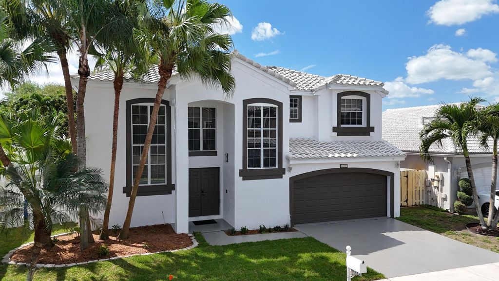 Photo of 10372 SW 9th Lane, Pembroke Pines, FL 33025 (MLS # B26004691)