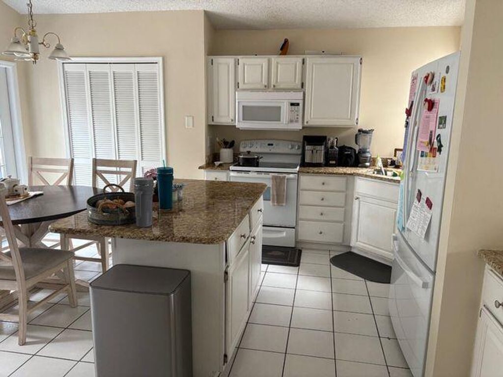Photo of 12665 Coral Breeze Drive, Wellington, FL 33414 (MLS # R11141972)