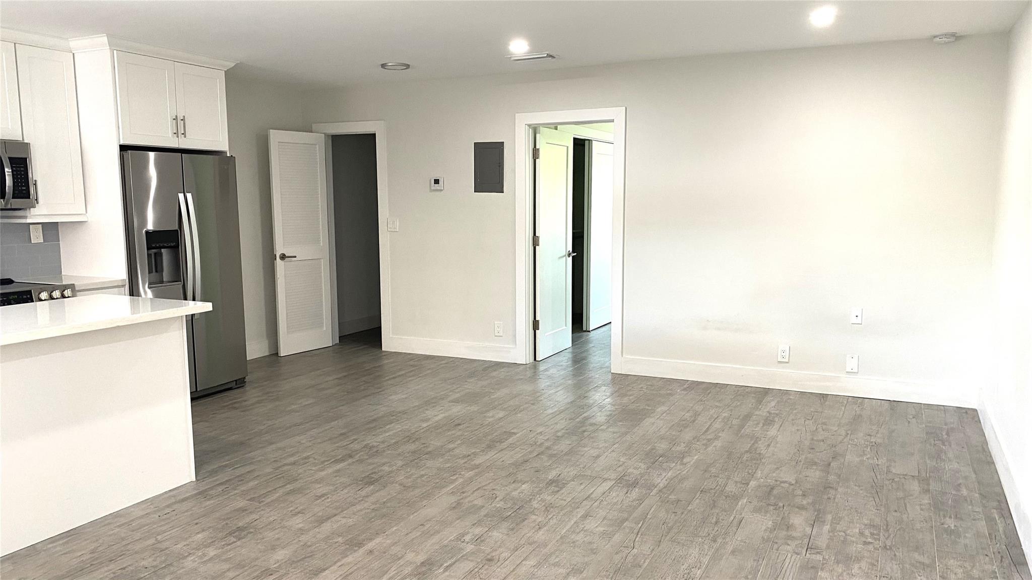 Completely renovated 1 bedroom & 1 bath unit in a apartment building located on the 2nd floor. New kitchen cabinets, stainless steel appliances , Quartz countertops & tiled throughout the unit. Impact windows and door. In unit washer & dryer. 680 minimum credit score required, must earn 2.5 times the rent per month, gross. Rapid approval process. Room for one parking space only.