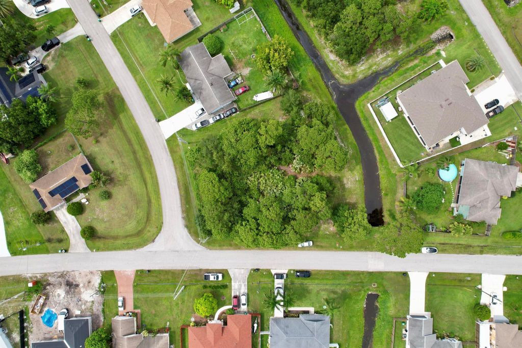 Photo of 2191 SW Burlington Street, Port Saint Lucie, FL 34953 (MLS # R10904412)