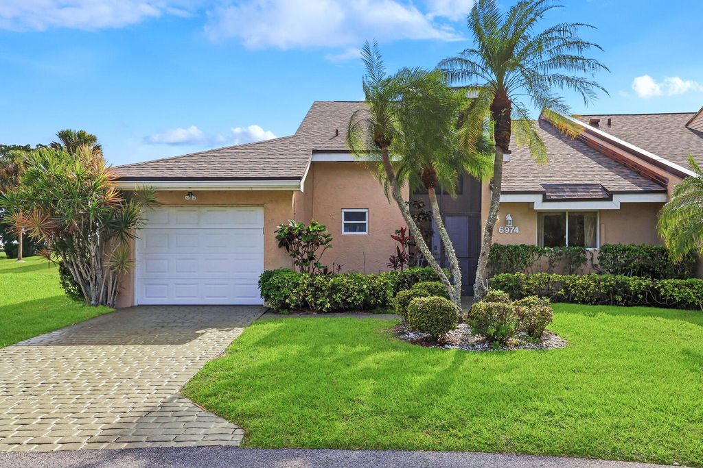 Photo of 6974 Fountains Circle, Lake Worth, FL 33467 (MLS # B26010471)