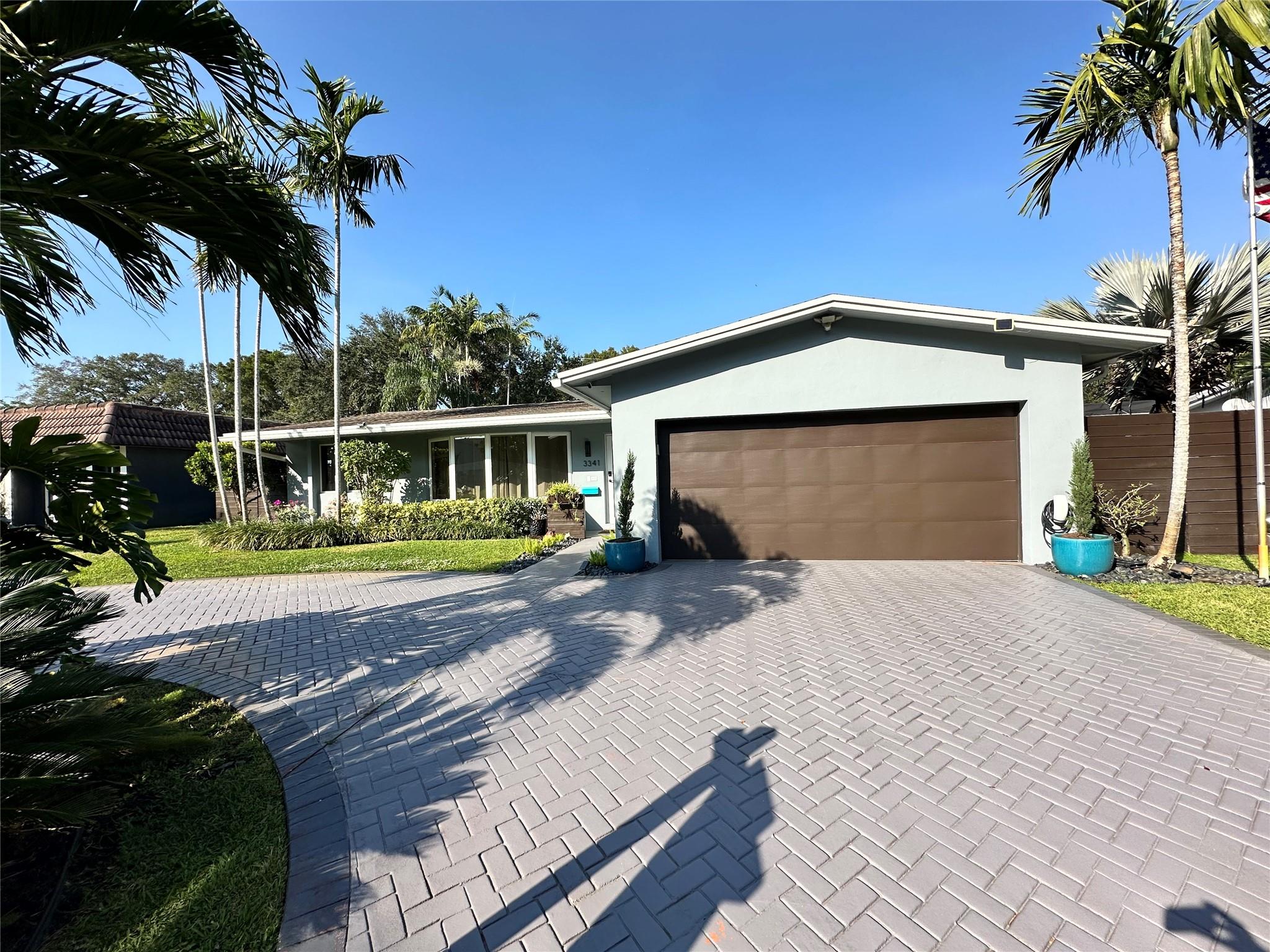Stunning modern 3-bed, 2-bath home in Hollywood Hills with a private saltwater pool. Features include a 2-car garage, brand-new A/C, new ducts, and a fully remodeled interior (2020). Tankless on-demand hot water. Enjoy a fully gated, artificial turf side yard. Ample closet and garage storage. Available immediately for annual lease. Landscaping, pool maintenance and exterminator included in rent. Owner/Agent. Min credit 650. First, Last and Security are move in costs. Dog friendly landlord - dogs allowed with pet deposit.